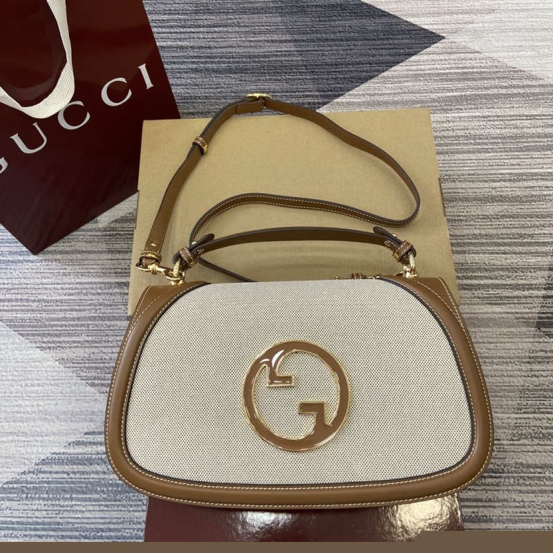 G*u*i top handle bags